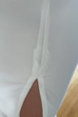 I have this dress in black and loved it. Thought I would get it in white for my engagement photos, but I'm super disappointed with the quality. It's see-thru so you can see all the poor and messy stitching. - Vanessa G.