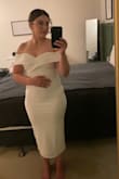 Love this dress! It's is super comfortable and very stretchy, which is good because I bought the wrong size. I'm normally a 6-8, but I all my individual measurements fell under the small. Definitely should have gone with the medium, but I still love the dress and I'm very excited to wear it for my bridal shower! The bow just snaps onto the back (not included in the pictures). - Tori G.