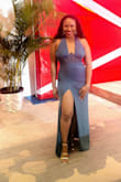 I got many compliments in this dress. The color and style are as seen. I had to shorten the straps around the neck a bit but the rest of the dress fit perfectly. - Shatanya M.
