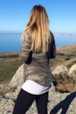 I love this top! It fits true to size, and it's the softest material. It's definitely on the thinner side, but it's not too sheer. - Danielle W.