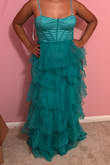 My daughter looks stunning with the dress. I love it. - Anabel P.