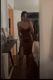 Very nice, high quality material. The color is beautiful. It will be a great dress for a fancy wedding. The picture is bad quality but it is very nice in person. - Laci B.