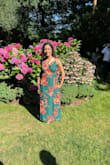 It's beautiful and it fits nicely because it straps makes a nice shape of the body. Nothing see through. I am 5'2'' and it was 3 inches too long with high heels on but an easy fix. It was the first choice of my friends between other 2dresses I bought. I ordered an XS. It's good for someone with small boobs like me. - MARIANA L.