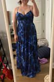Bought this for my brother's wedding. It fits perfectly and is very flattering. I'm very short but have a larger chest so sizing can be very iffy for me. The chest fits well with good support and isn't overly revealing. I've seen other reviews saying the quality of the straps is not good. They are very thin so you should be cautious with them, but I will need to wear it for more than a few minutes to know if they'll be okay. I plan on bringing a sewing kit/safety pins the day of the wedding in case they break. This dress is meant to hit above the ankles but is floor length on me, which is what I wanted. I'm 5'0" for reference. I will only need about an inch off the bottom if anything, when I have heels on. Very pretty! I'd recommend. - Jacqueline C.