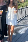 I wore this dress for my engagement party and it fit like a glove! Was so comfortable and had a bit of stretch. I got so many compliments and felt amazing in it. Would highly recommend! - Maggie A.