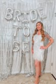 This was the perfect bachelorette dress. It was a bit see through as some have stated, but I purchased a strapless white slip to wear under it and it was perfect. Get the dress, you won't be disappointed. - Lindsay G.