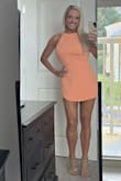 Thus romper is stunning! The orange sherbet color is beautiful and flattering! - Tina M.