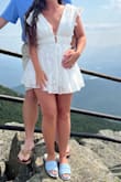 This romper is beautiful, I got many compliments on it. It fell off my shoulders easily so I stuck it on with double-sided tape. - Brittani P.