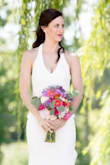 I got this dress as an option for an affordable wedding dress alternative for a simple beach wedding. The material is great quality for the price and hugs every womanly curve perfectly :) I added a pretty lace/rhinestone belt to dress it up a little more and it's exactly what I was hoping for! This could also be a lovely option for rehearsal dinner. - Marybeth H.