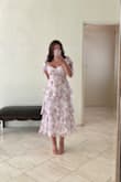 This dress was soo cute and perfect for a summer wedding guest. Did not require a bra for me because the material was so sturdy. but it also had no stretching so I would get a size up if you're in between sizes, love this dress though! - Jolia S.