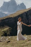 I ordered three dresses to try on for my ceremony in the mountains and this one was the winner! It fit like a glove and super comfortable to move around in. I had it hemmed and a bustle added. So so happy with it. - Kelly S.