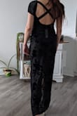 This dress is so pretty and it fits like a glove. The aterial is so soft and light. It looks very sexy. - Elham S.