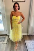 I love this dress! The yellow is very pretty and soft. It is very form fitting through the bust and sits perfectly and doesn't fall down. The length is great for summer. Medium fit perfect with a little stretch as well. - Jamie L.