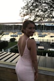 Wore this dress to my cousin's wedding and it looked beautiful! I got so many compliments on it! I did have to hem it and tighten the straps about an inch, but other than that, it was perfect! - Jessica C.
