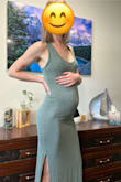 I bought this dress in a small. Typically, I'm an xs, but I wanted to be able to wear it throughout my pregnancy. It fits wonderfully and is very flattering. I can easily keep it casual and wear it out running errands or dress it up for a nice dinner or as a wedding guest. Works well with flat sandals and heels. Definitely will be wearing this throughout my pregnancy as well as after. - Helen F.