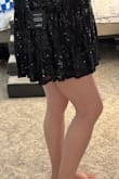 This is very cute. Fits great BUT it's super short. I am 5'9 and it barely covers my butt (few inches of fabric I'd guess). If I lift my arms at all, my undies are out lol. I could wear shorts but that's not the look I wanted. Cannot return since it was final sale. If you are short, this would be great - Shannon M.