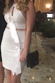 I wore this to dinner and a club in Miami for my bachelorette party. It was so cute. It fit perfectly. It has stretch. You can kind of see underwear lines even in a thong but it was still do-able. Thick enough where it isn't see-through. Wouldn't have changed my outfit choice! - Alana P.
