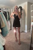 I got this dress for Vegas and it's perfect! A little stretchy and the bow is a pin so you can take it on & off. Loveee it! - Avery B.