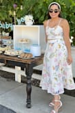 I received so many compliments on this two piece dress! It is the perfect spring event outfit! The material is light and airy but thick so you do not need to worry about it being see through. Plus, it hugs your curves in all the right places. - Ana G.