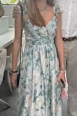 The dress is of more quality than I expected. It fits very nicely and the fabric has really good quality. - Elaine O.
