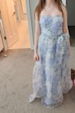 This dress fit my daughter perfectly.  Will need to get the length shortened but an absolutely amazing fit for how tiny she is. - Camille P.