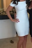 Was looking for a white dress for my bachelorette party and this wasn't perfect! It's sexy yet classy. Fits tight but that was the look I wasn't looking for. The material is stretchy and thick enough so it isn't too sheer. I did see a small rip in the seam by the cap sleeves after my first time wearing it, but it was an easy fix! - Lindsay P.