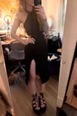 This dress is definitely cute. I found the slit to be a bit much to wear to a wedding, but I kept it anyway for date nights. I got an XS because nothing else was in stock, I definitely was squeezing into it and a S would have fit perfectly. Also, I'm 30G but there wasn't an option for that. This dress accommodates a large bust and minimizes it, which I appreciate. - Jess D.