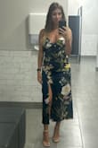 Very flattering, super expensive looking material. It fits very light because of thing material. I got it in both colors and LOVE it!! - Jasmin K.