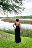 Beautiful dress... It fit like it was made for me! Most dress are on the short side but I am 5'9 and I needed heels. The material has sone stretch and heavy enough to hide those unwanted spots but ok for summer evening. Got a lot of compliments! After trying on another dress my hubby said THAT is the one! - Holly N.