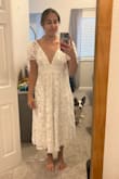 I'll be wearing this to my rehearsal dinner! As a taller girl, it hits at a very flattering point (it may hit more like a maxi dress if you're shorter). The flower fabric is well made and lays well, and the sleeves aren't so poofy that they're up in my neck. Great quality for the price! - Sophie K.