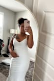 This dress is absolutely gorgeous. Fits true to size and snatched my waist. However it came with a stain. I don't have time to exchange for a new one because I'm going on vacation out of the country. It really is the perfect dress for an all white dinner I'm attending so I'm very disappointed that it came with a stain. - Monique J.