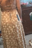 I love this dress so much. It fits like a glove. I'm very short and petite but thicker on the bottom and I've never ever had a dress fit me so well. - Paige S.