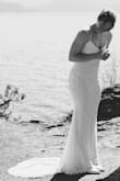 Wore this for my intimate wedding ceremony and I was so happy with the result! The straps on the back are easier to get positioned right with help but once the dress is on it's secure and looks amazing! I definitely could've used an extra inch or two to fully cover my heels but overall it was great for my wedding! - Hannah M.
