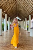 I  have worn this dress twice on 2 separate summer vacations and I got So many compliments on this dress. Loooooove this dress. The gold is gorgeous.  Sad they are all out of mediums in red because I would Have bought another! - Jessica H.
