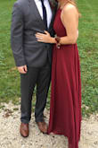I wore this dress as a personal attendant in the wedding and it was perfect. Stayed up all night, good quality, and was very comfortable! It was a tad big in some areas but all I had to do was tighten the straps and this fixed any looseness on the sides. I did have to get it hemmed because it was quite long and I would have tripped over it even with 3 inch heels. But overall a beautiful dress and a great buy! - Allison L.