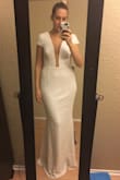 This dress has been on my wishlist for months... I finally bought it with a VIP discount code. I have nowhere to wear it and I don't care! It's a smidge large, but I don't have tiny arms and having the cap sleeves actually fit is wonderful. I assume I'll get it tailored someday, but I love it to bits. - Ellen P.