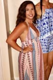 I wear this dress all summer. The straps are adjustable but I actually cut the back two off and made it into a halter. Makes my boobs look good and feels more secure. Honestly the most comfortable dress I own. Did have to get it hemmed but I'm just short and have to get all my clothes altered. I'd give this dress 10 stars if I could. So cute and comfortable. Highly recommend. - Emily G.