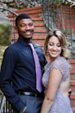 This dress is literally so beautiful! It looks just like the stocked photo. Its a pale purple lace dress. I wore it to my uncles wedding and it fit perfectly. It didn't hike up and it wasn't too tight to dance in. The open back was a nice touch and sat in the perfect spot for me. My underwear wasn't showing or hanging out at all. Not too sexy and not too conservative. Perfect date night dress! - Alex L.