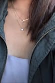 very simple and cute without looking too flashy! i love how the chain is shorter so it's more of a choker style - Maikhanh T.
