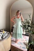 I ordered this dress for a black tie wedding and I was a little worried it might be too light, but it's perfect!! It is a little more green in person and fits amazing!! I wish I could have it in every color! I also just love Lulus everything... I've been ordering dresses from them since freshman year of high school for proms - Mackenzie H.