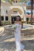 I got so many compliments on the dress. I wore this for my courthouse marriage ceremony, but I cut the sleeves and wore them detached because you can't lift your arms past elbow height while attached. - Sophia S.