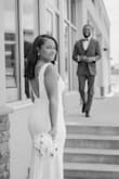 I went back and forth on this dress at first, but I'm so glad I stuck with it! It was the perfect blend of elegance and minimalism for my civil wedding. I did have it hemmed about an inch to an inch and a half so that it wouldn't drag on the floor. I also wore shapewear shorts underneath, and they didn't show with the low back (I was worried about this). The fabric does have some weight to it, but I was able to lift it easily, making it bathroom friendly :). I highly recommend! - Khristian H.
