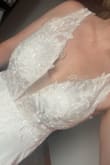 This dress is beautiful! It fit perfectly beside the length. I had about 6 inches taken off the bottom. Very excited to wear it on my wedding day! - Erica T.