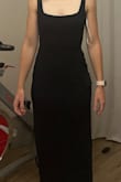 I absolutely adored this dress, but ultimately had to return, due to it not fitting in the bust. I am an XS for bust, S for waist, and M/L for hip. It fit great in the waist, and the column style bottom was perfect for my larger hips. I loved the sparkly detail around the top of the dress. It's not rhinestones, more of a glittery trim. It is just the perfect amount of sparkle. The square neckline is classic, and the back is stunning! I just couldn't find a backless bra that would give me enough extra boost to fill out the bust. So sad! It's beautiful! - Kaitlyn G.