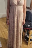 It is a cute dress. I ordered xs, and it fit me well. I am 5'2 and the dress is too long for me. Even with 4-inch high [heels], it has to be fixed. - Luz R.