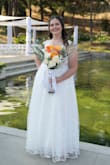Beautiful dress that I wore for my summer in July wedding. Love the way it fits and looks. Almost makes me feel like a princess with the way the bottom flares out. A little bit too low in the chest area for me, so I had it tailored to bring in the sides and get rid of the cleavage. But other than that, fits great! - Katie C.