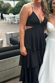 Dress was beautiful and I got tons of compliments on it. Only struggle was finding a bra that was still hidden behind the dress. I personally used boob tape. It supports you fine honestly just needed to cover my n*pples.
I wore 2 inch heels with it and in flats it just touched the floor - Kerry P.