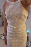 The lace is pretty and the fit is nice around the hips/waist. But for my chest area (28B), it was a tad bit loose and it also is a very rough material, the lace isn't soft. It's very thick and made of thick thread so it's not the most silky and soft to wear and when bending a little bit or even walking or raising your arms, it does a weird pokey triangle thing that you can see in my pictures. It was NOT see through at all, even with black underwear. I did return this. - RISHITA P.