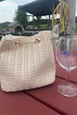 The moment I saw this bag I knew I needed it!! So cute for going out. The straw material is sturdy. Has been holding up well!! - Stephanie D.