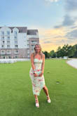 I recently wore this dress to a wedding, and it exceeded all my expectations. The fit was absolutely perfect, hugging in all the right places. Despite the humid weather, the dress didn't feel sticky at all. Not only did it look amazing, but it was also incredibly comfortable to wear throughout the entire day and night. The fabric felt luxurious and allowed for easy movement, which was great for dancing. I received so many compliments and couldn't be happier with my choice. I highly recommend this dress to anyone looking for a stunning and comfortable option for a special occasion! - Megan M.
